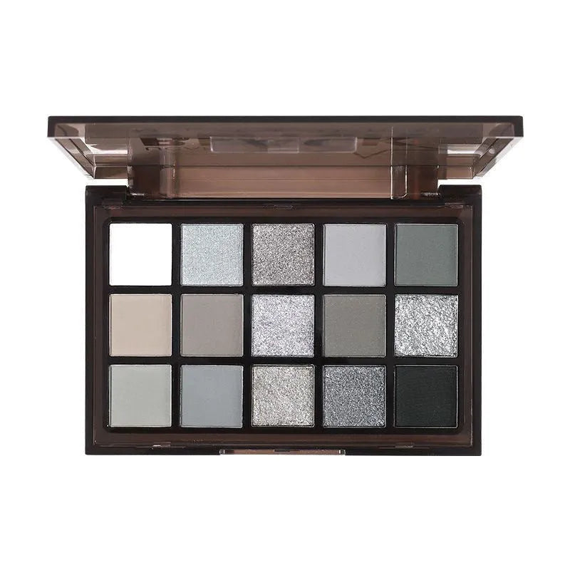 15-colour eyeshadow palette showing grey, black, brown and blue matte and shimmer shades