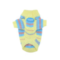 Blue and yellow striped wool jumper for small dog on autumn winter background