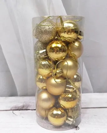 Assorted shiny red, gold, silver, and blue 3 cm Christmas baubles in a box and a storage barrel.