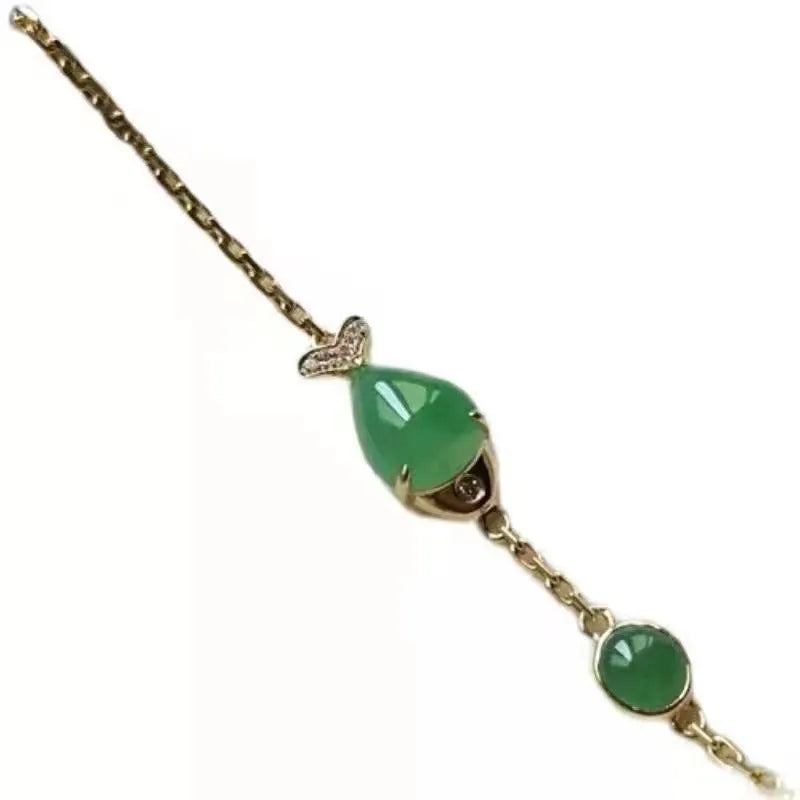 Retro-style yellow gold electroplated women's bracelet made from copper and plastic.