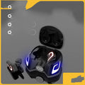 Black and grey in-ear Bluetooth gaming headset with silicone tips on a dark background.