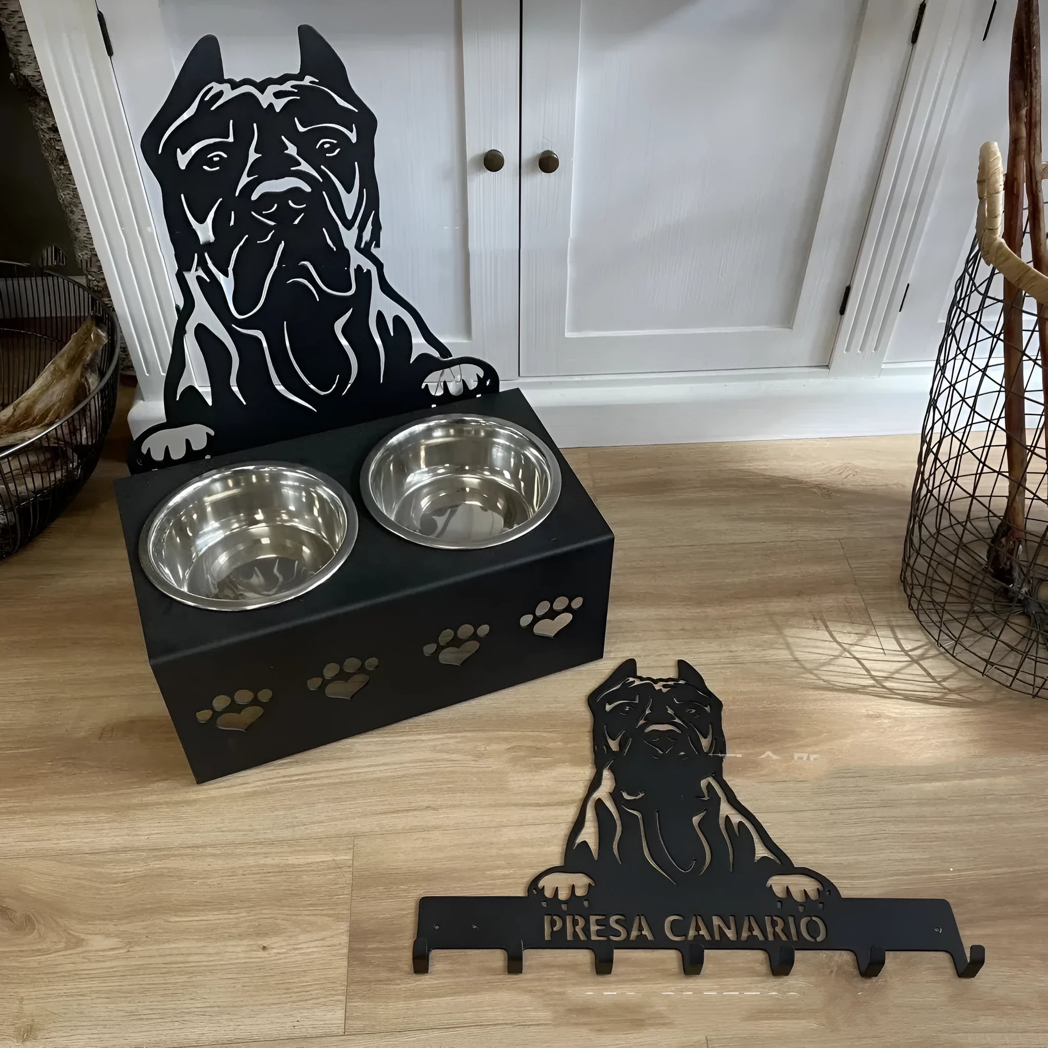 Customised dog bowl holder with dog's name, stainless steel basin and black iron frame.