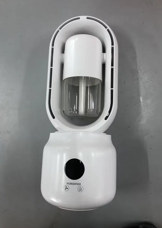 White bladeless table fan with humidifier tank on a wooden desk