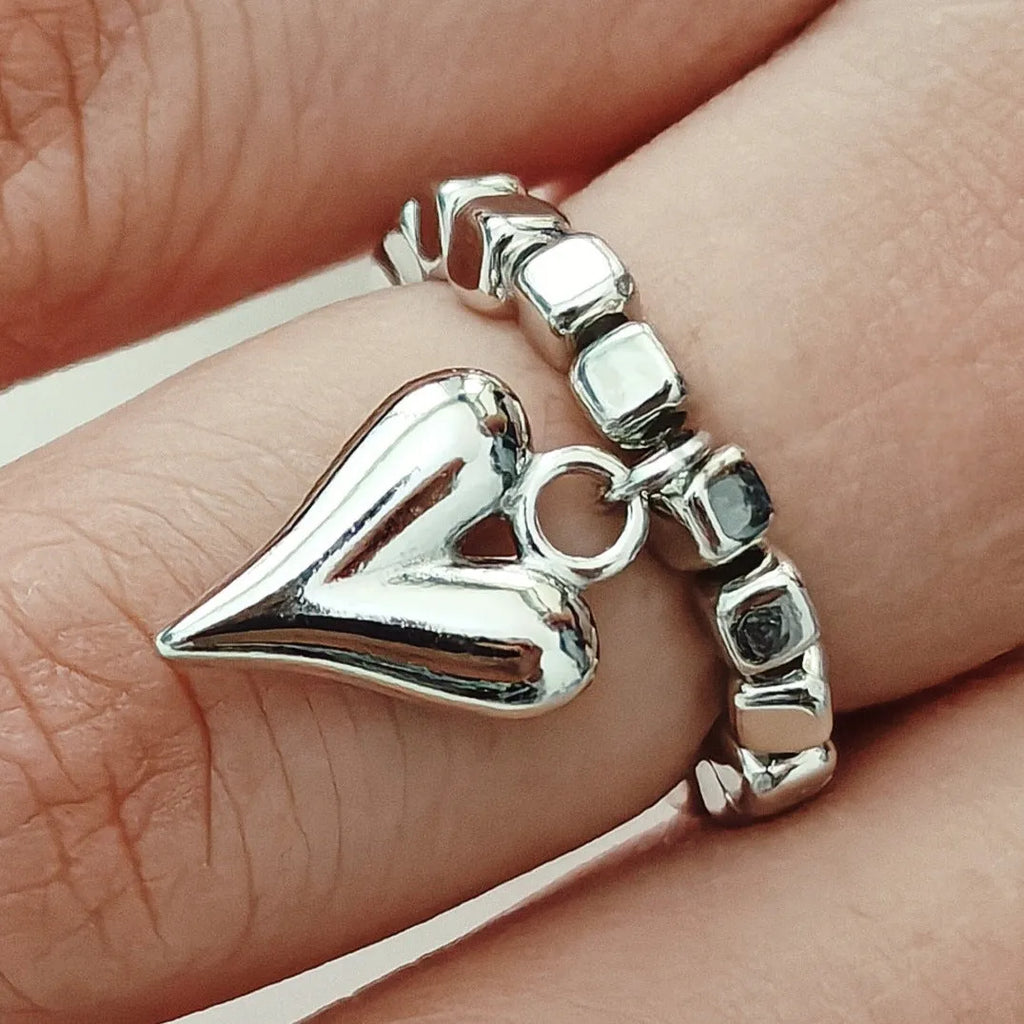 Handmade beaded elastic string love ring with geometric heart design in electroplated colours