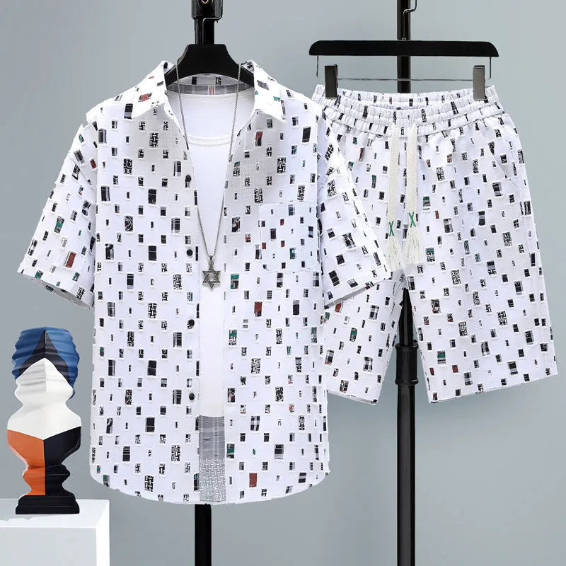 Men's casual polyester sports set with short sleeve top and matching shorts on a manikin.