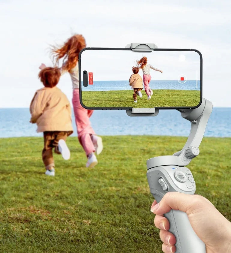 Grey hand-held three-axis anti-shake stabiliser with AI face tracking and fill light for short video shooting