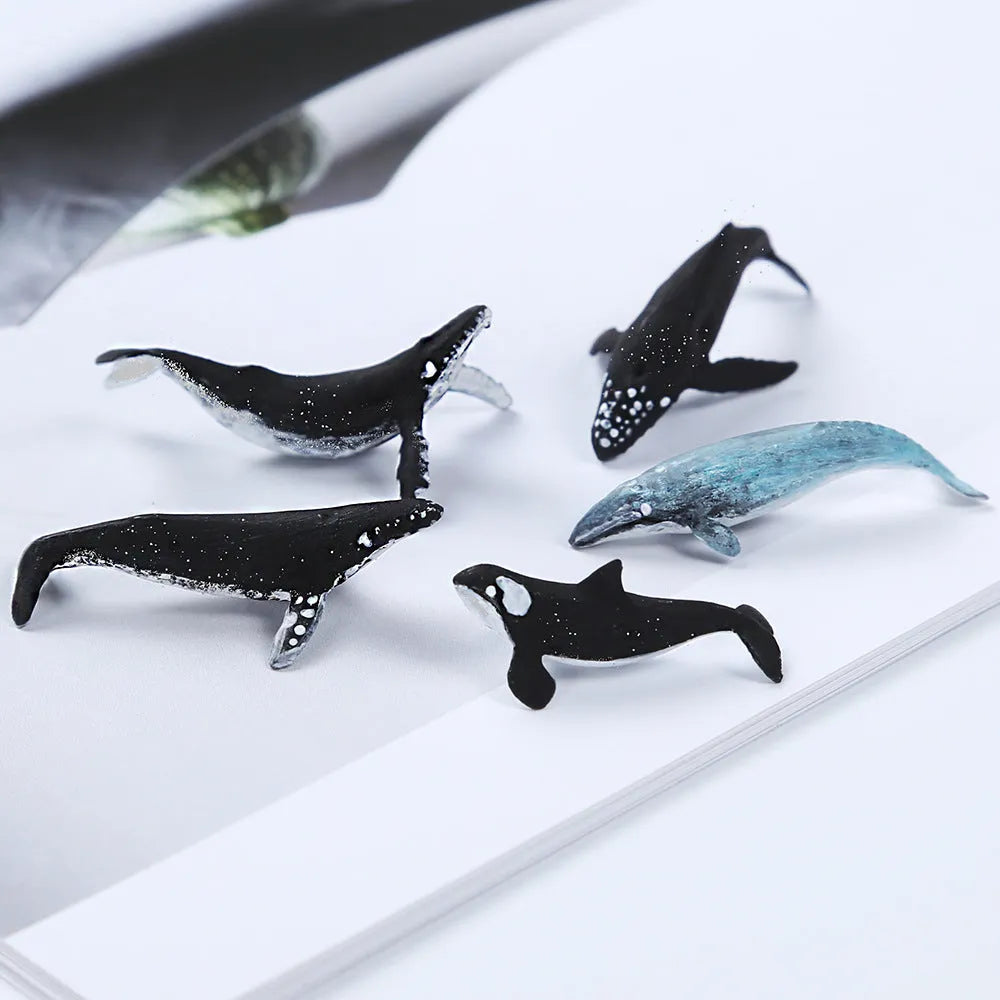Plastic crystal glue ocean whale model in jump water humpback pose