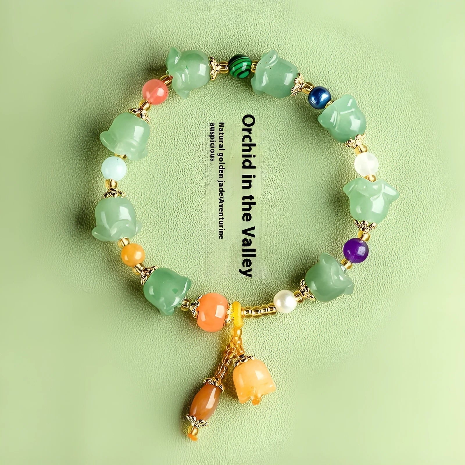 Carved natural Xinjiang Jinsi jade bracelet with aventurine orchid beads and Gobi jade topaz accents.