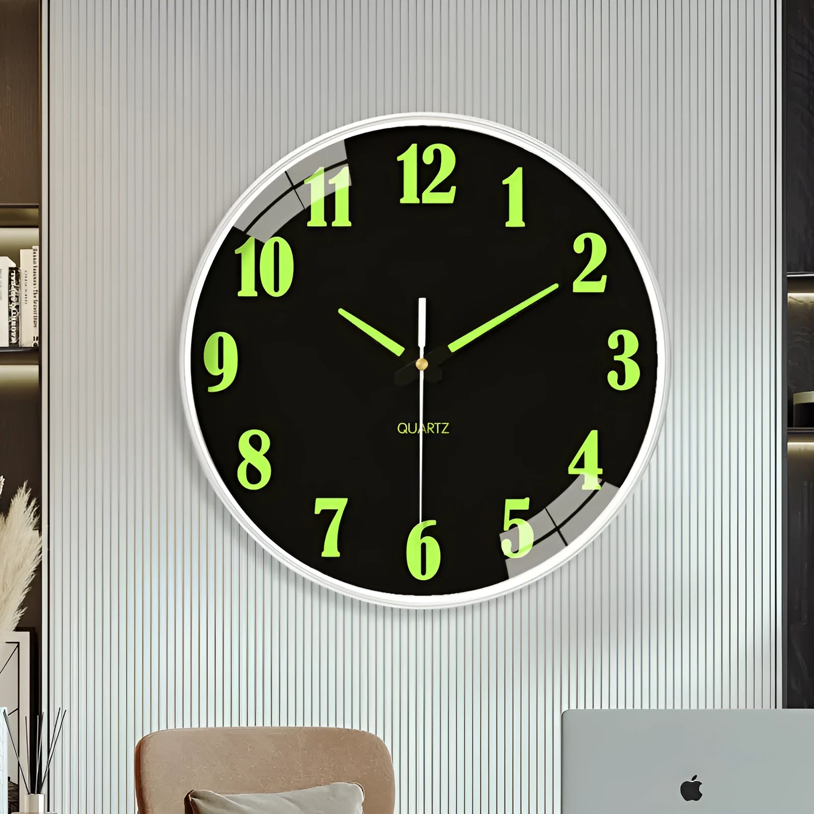 Modern 8 inch luminous wall clock in plastic case on a wall.