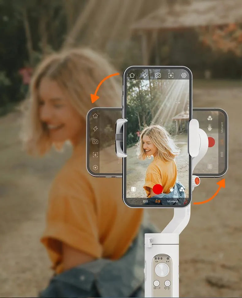 Black 3-axis mobile phone stabilizer gimbal shown in folded position next to a selfie stick.