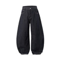 Men's wide leg denim trousers in original cow colour showing mid waist design and relaxed fit