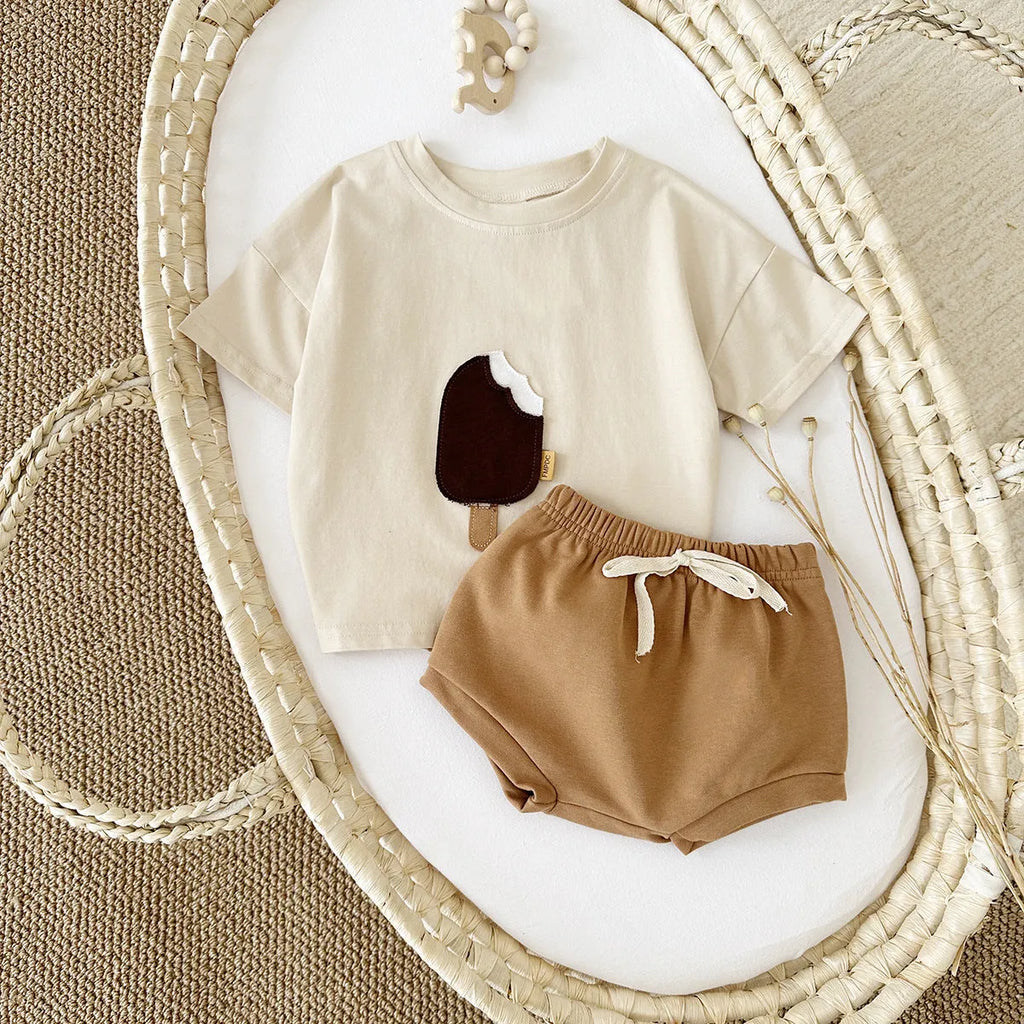 Girls' apricot cotton shorts suit two-piece set with ice cream patch on shirt.