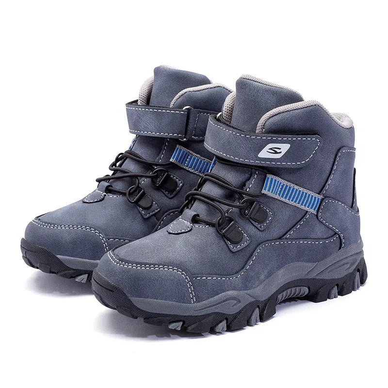 Hobby Bear black children's Martin boots with velcro buckle on a non-slip rubber sole.