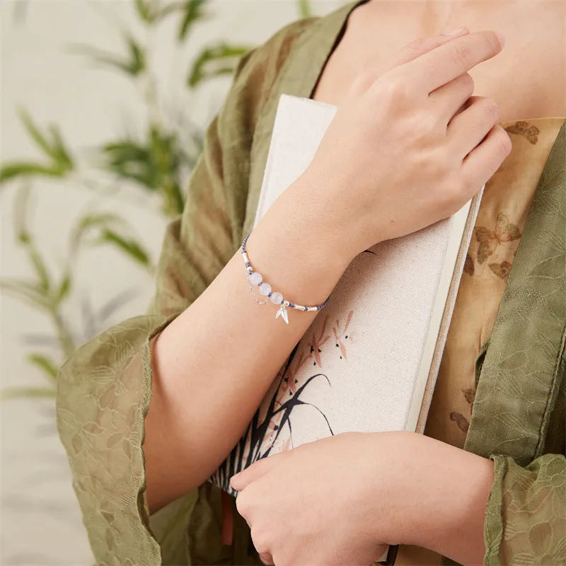 Hetian jade chalcedony diamond-shaped bracelet with lotus seedpod design on woven strap