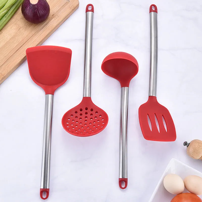 7 piece silicone kitchenware set with stainless steel tube handles including spatula, colander, and egg beater in red and black