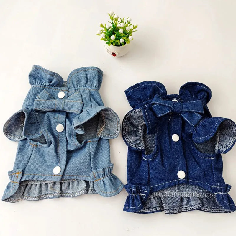Blue denim dog dress with ruffles vest detail and a metal leash hook on the chest.