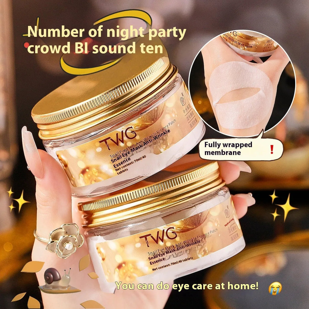 Box of snail essence paste eye mask containing 40 individual tablets for dark circles and fine lines.
