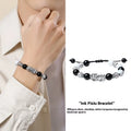 Handmade woven couple bracelet with sterling silver card and animal tassels