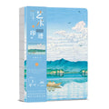 Hardcover Ukiyo-e art notebook open on a desk, showing the Kanagawa wave design and A5 size.