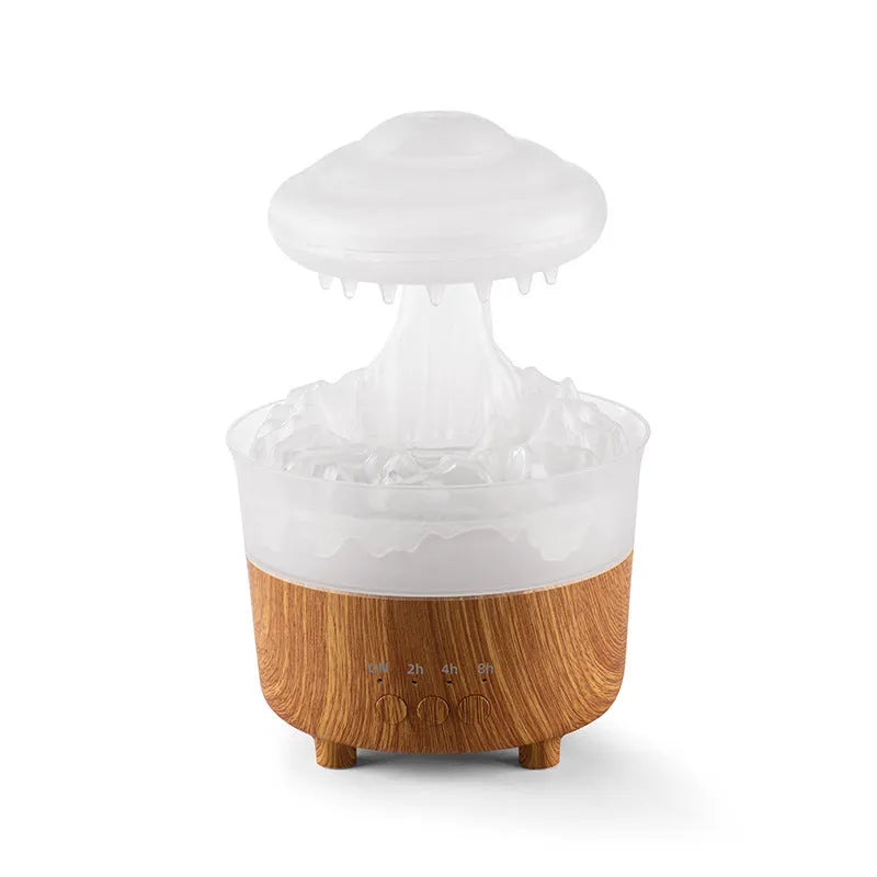 Wood grain white rain cloud humidifier diffuser with glowing LED light and water droplets.