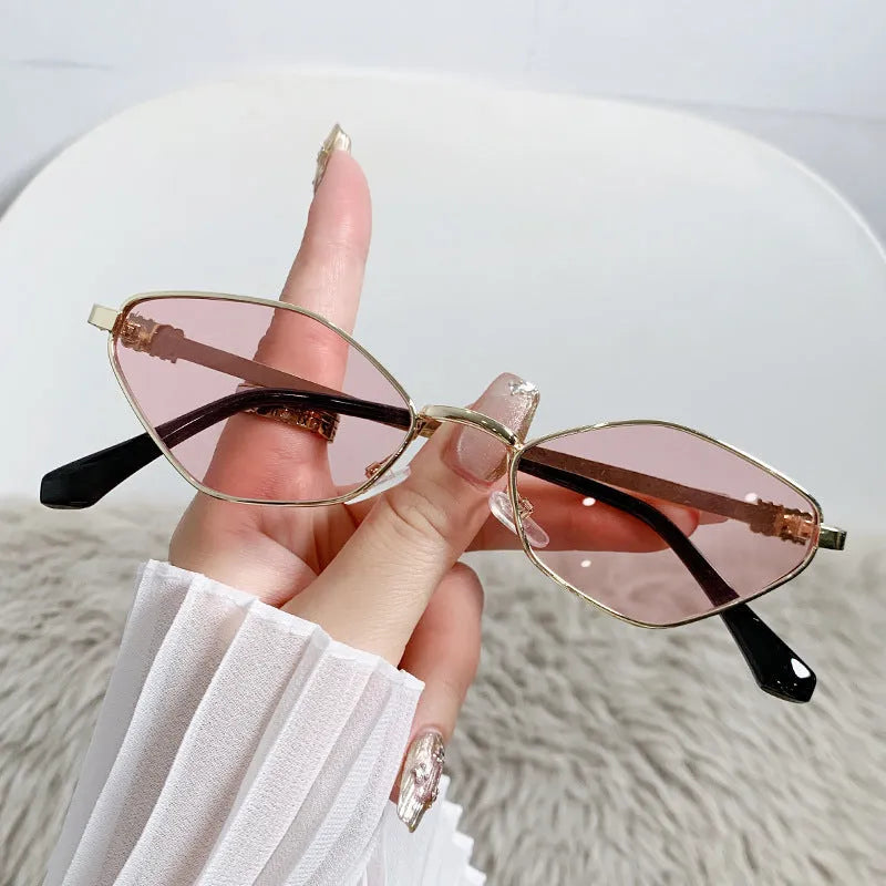 Gold metal small frame cat eye sunglasses shown with multiple lens colour options including grey, tea, and pink.