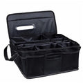 Black Oxford cloth cubic car boot storage box showing dimensions of 33cm wide by 33cm deep by 16cm high.