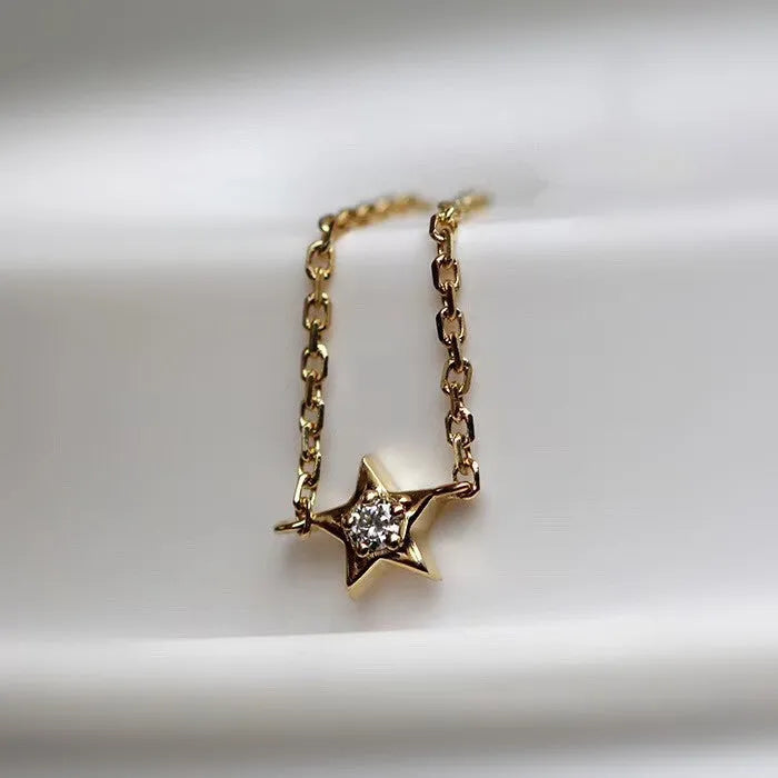 18K yellow gold adjustable star ring with two diamonds on hand, women's light luxury design