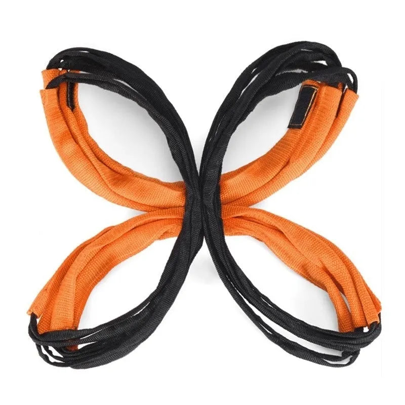 Plastic butterfly agility ladder and jump grid set for youth athletic training on a flat surface.