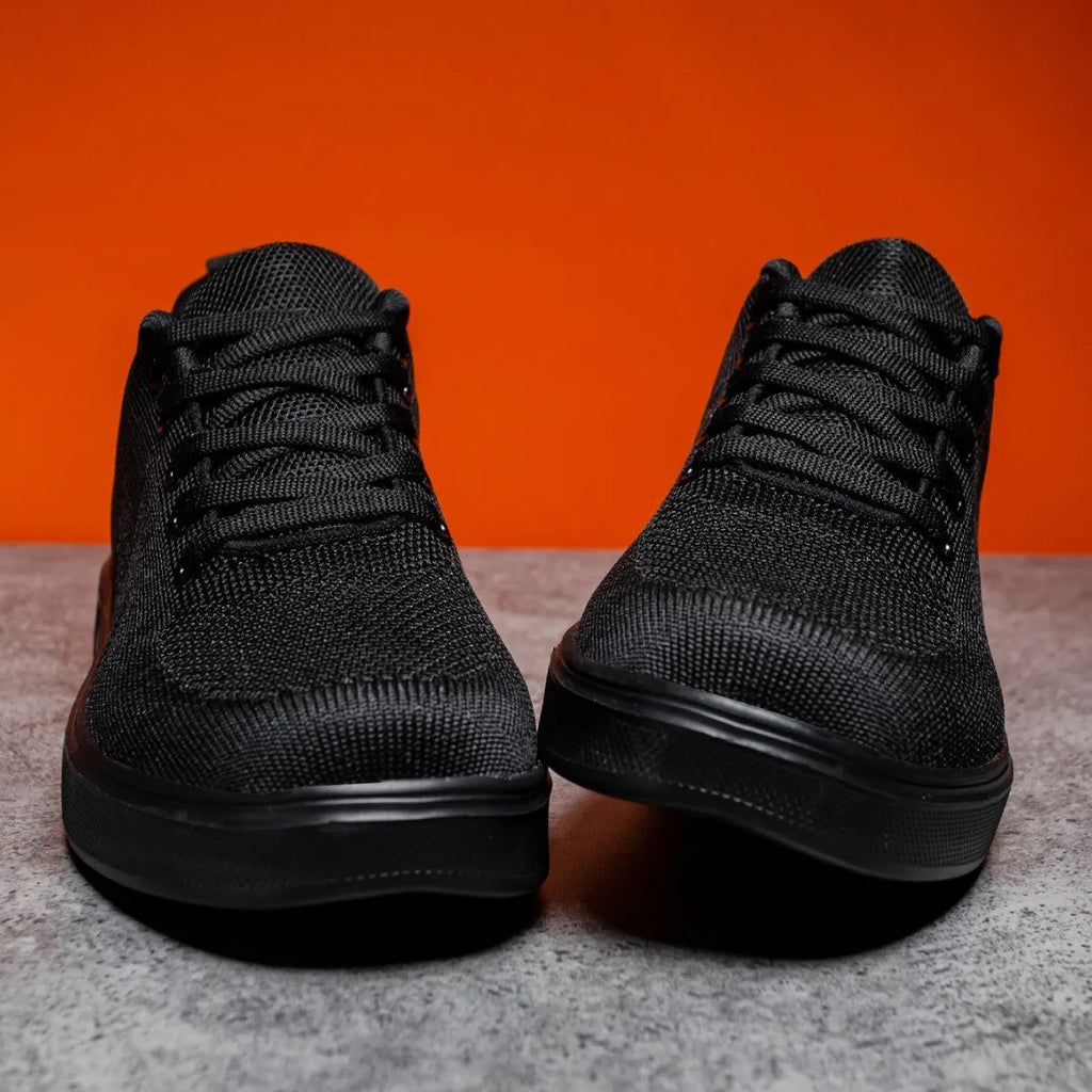 Light white unisex trainers with thick EVA sole and mesh upper in black or white colours