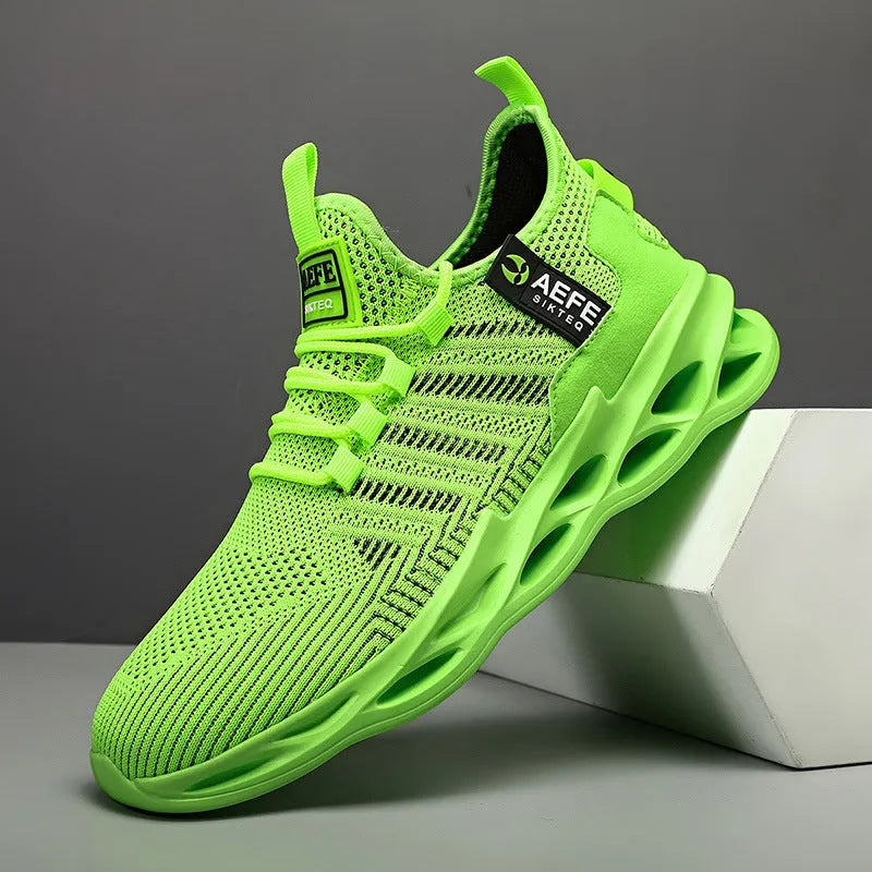 Men's black mesh casual running shoes with cross strap detailing and round toe, shown on a plain background.