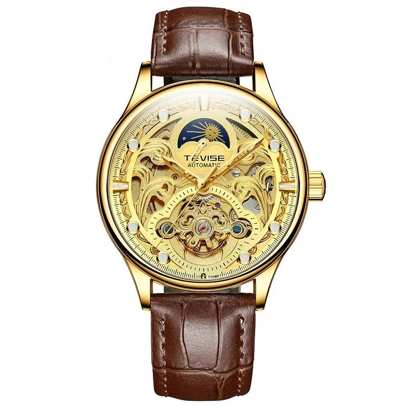 Men's gold leather strap automatic mechanical watch with analogue dial on wrist.