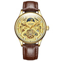 Men's gold leather strap automatic mechanical watch with analogue dial on wrist.