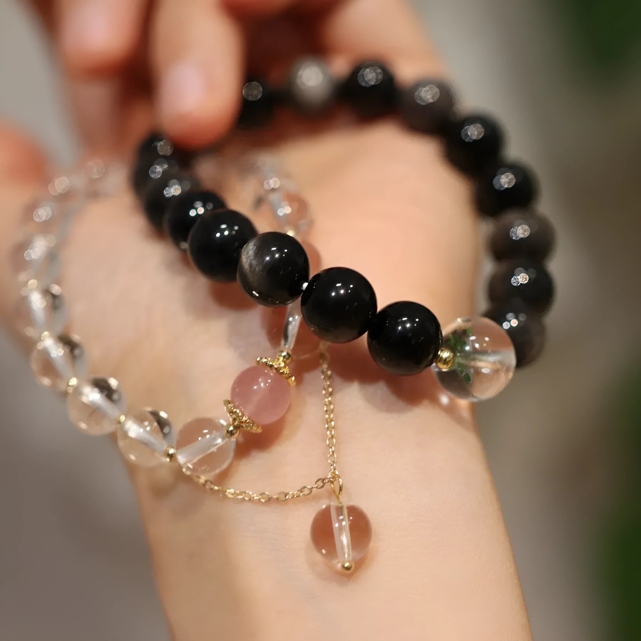 White crystal bracelet with cat eye obsidian details in Chinese geometric style