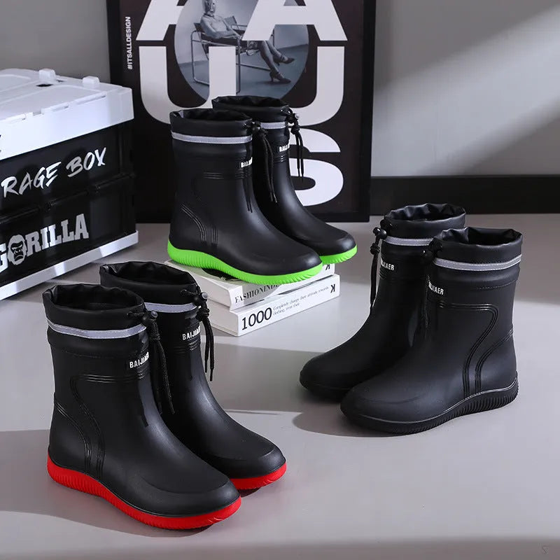 Men's waterproof mid-top rain boots with PVC upper and non-slip plastic sole in British style with tassel detail