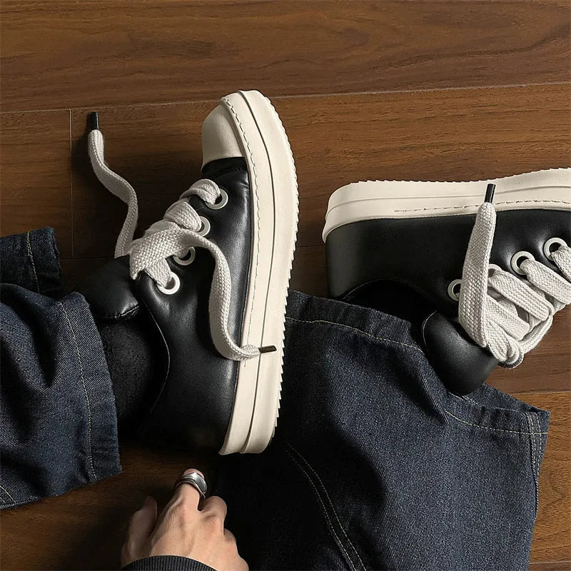 Men's black leather slip-on casual shoes with flat rubber sole and round toe.