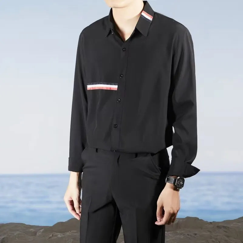 Hong Kong style loose-fit cotton blend cardigan shirt in light blue, showing non-ironing casual design.