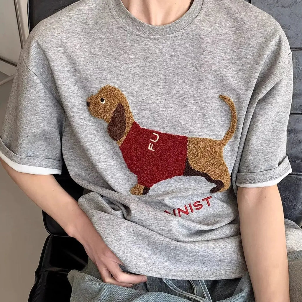 Men's grey cotton T-shirt with embroidered sausage dog wrapped in towel design