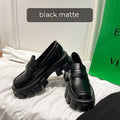 British style wide fit patent leather loafers with a rubber sole and muffin heel base.