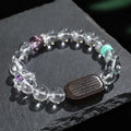Natural white crystal ebony five warp bracelet showing handmade ethnic design with wood and crystal materials