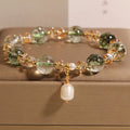 Green phantom quartz and chorite crystal women's bracelet with champagne gravel accents
