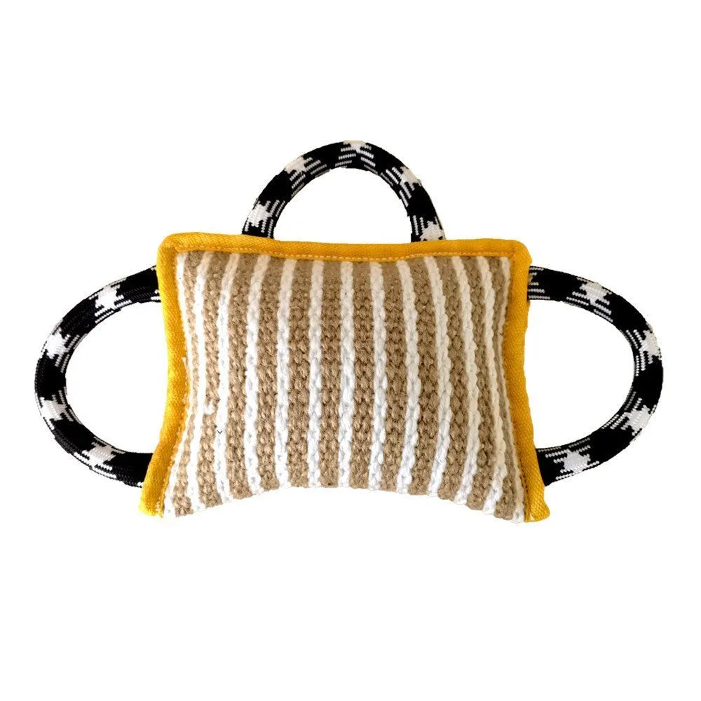 Jute dog tug toy with three rope handles and a central bite pillow for interactive play.