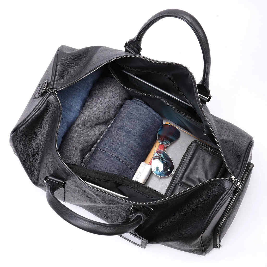 Men's black leather excursion tote bag with single shoulder strap showing 44cm and 55cm size options