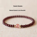 Women's garnet bracelet with U-shaped design and polished stones in 4mm or 6mm diameters