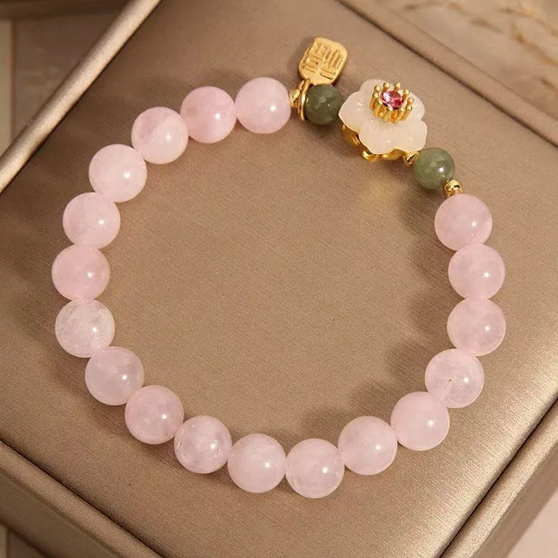 Crystal Hetian jade bracelet with peach blossom beads and camellia floral elements in pastoral national style design