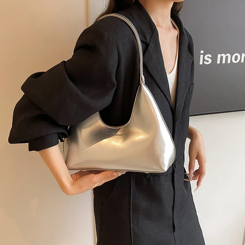 High Sense French PU shoulder bag in dumpling shape with sewing line detail and sandwich pockets