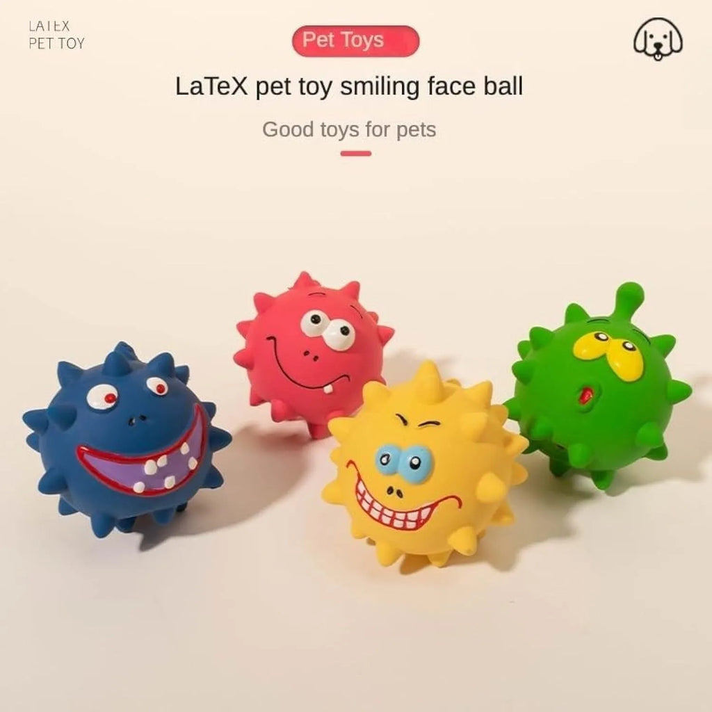 Set of four colourful squeaky dog balls with cute faces on a natural latex rubber texture.