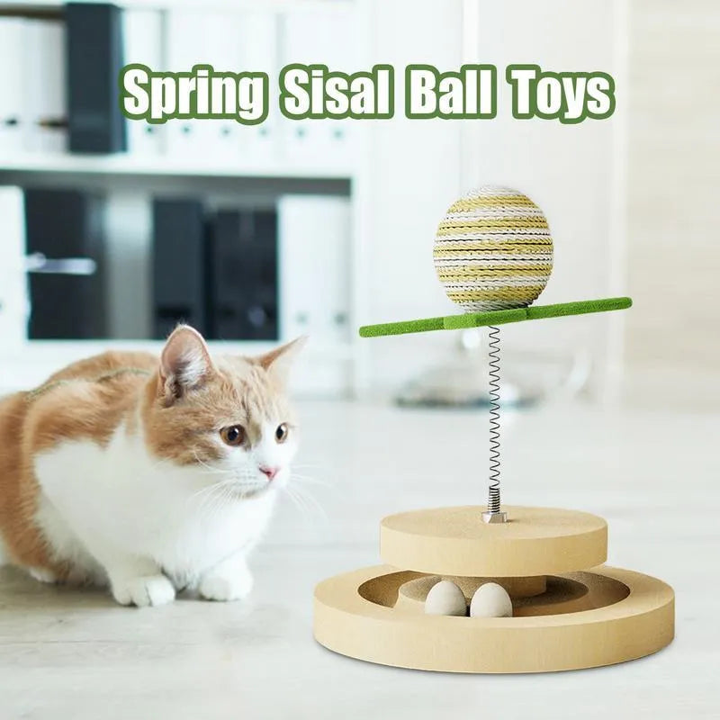 Green cat toy with a sisal scratching centre and a circular plastic ball track on a turntable.
