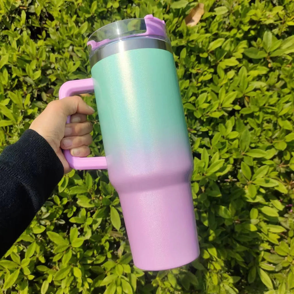 Large stainless steel vacuum insulation cup in a rainbow purple colour gradient.
