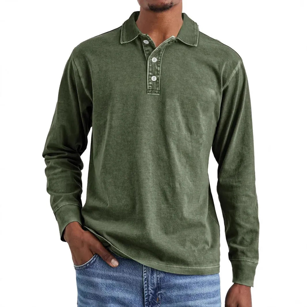 Man wearing a retro washed army green long sleeve polo shirt with a distressed lapel.