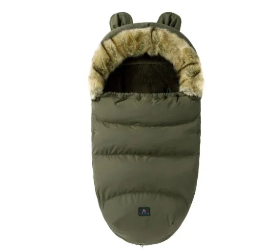 Baby warm cocoon style sleeping bag on a neutral background demonstrating solid colour design with zip closure